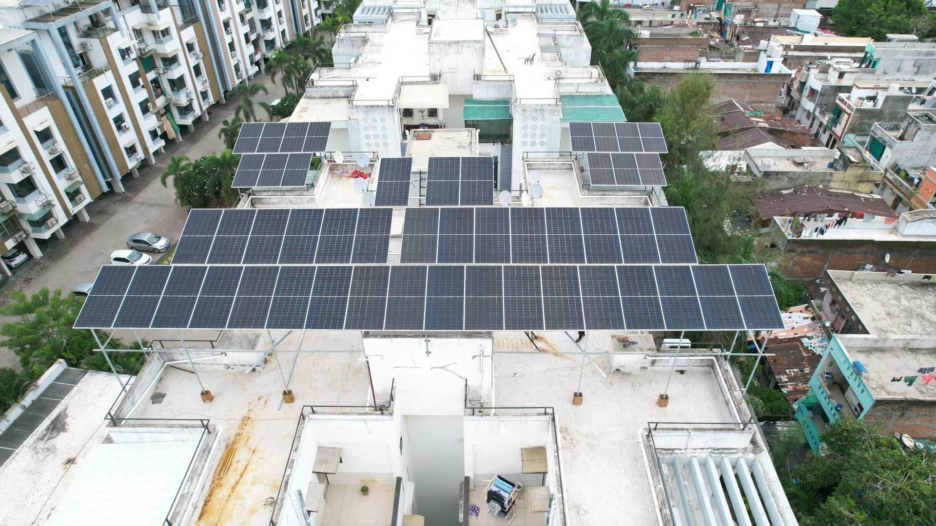 Solar installation on apartment building rooftop